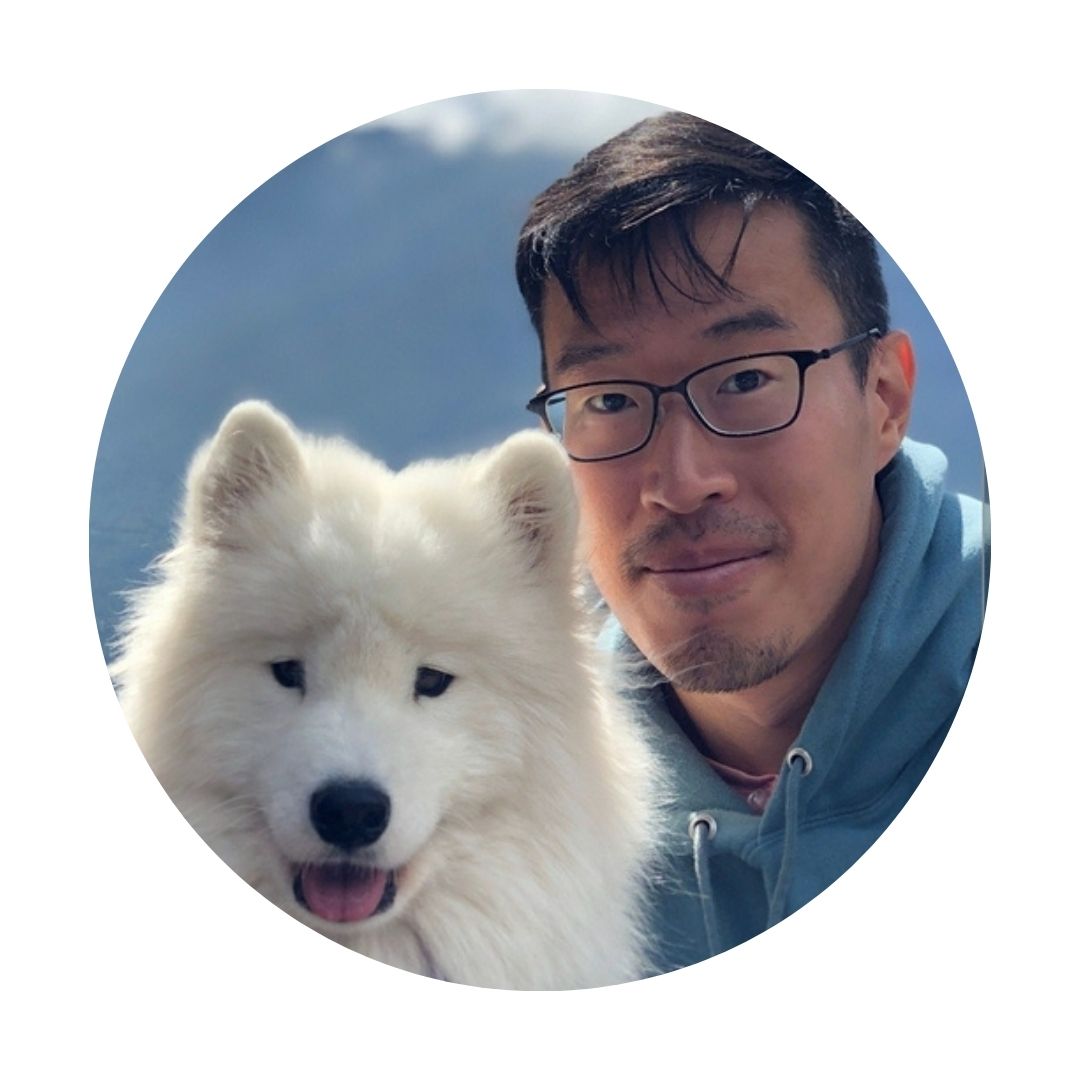 Clarence Yapp outside with white dog, cropped as a circle